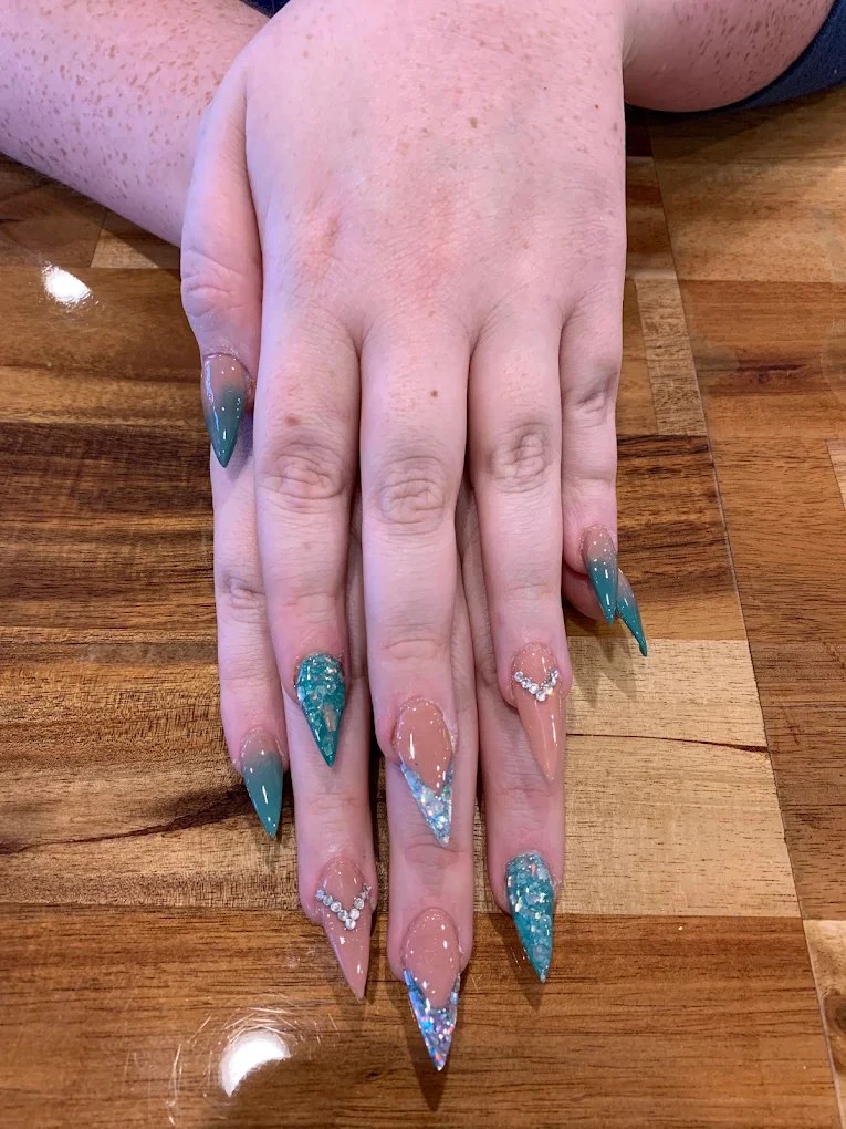 Soft pink French ombré fade on sculpted coffin extensions